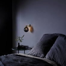 Load image into Gallery viewer, Globe Wall Light in bedroom.
