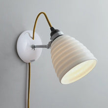 Load image into Gallery viewer, Hector Bibendum Plug-In Wall Light in Detail.
