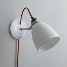 Load image into Gallery viewer, Hector Bibendum Plug-In Wall Light in Detail.
