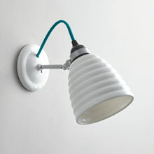 Load image into Gallery viewer, Hector Bibendum Wall Light in Detail.
