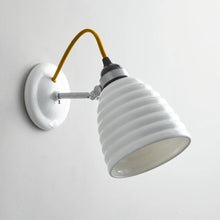 Load image into Gallery viewer, Hector Bibendum Wall Light in Detail.
