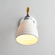 Load image into Gallery viewer, Hector Bibendum Wall Light in Detail.
