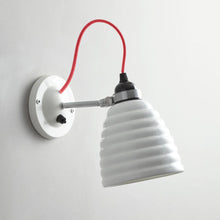 Load image into Gallery viewer, Hector Bibendum Wall Light in Detail.
