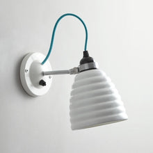 Load image into Gallery viewer, Hector Bibendum Wall Light in Detail.

