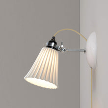 Load image into Gallery viewer, Hector Pleat Plug-In Wall Light in Detail.
