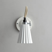 Load image into Gallery viewer, Hector Pleat Wall Light in Detail.

