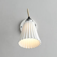 Load image into Gallery viewer, Hector Pleat Wall Light in Detail.
