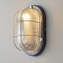 Load image into Gallery viewer, Oval Aluminium Indoor/Outdoor Wall Light in Detail.
