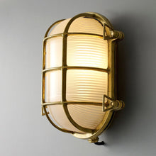 Load image into Gallery viewer, Oval Brass Bulkhead Indoor/Outdoor Wall Light in Detail.
