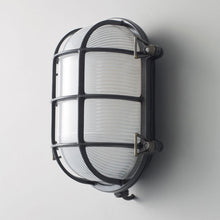 Load image into Gallery viewer, Oval Brass Bulkhead Indoor/Outdoor Wall Light in Detail.
