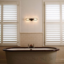 Load image into Gallery viewer, Weatherproof Ship&#39;s Well Glass Wall Light in bathroom.
