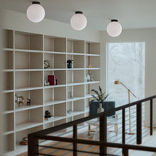 Load image into Gallery viewer, Bola Sphere LED Flush Mount Ceiling Light in Living Room.
