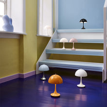 Load image into Gallery viewer, Panthella 160 LED Portable Table Lamp in stair.
