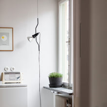 Load image into Gallery viewer, Parentesi Floor Lamp in living room.
