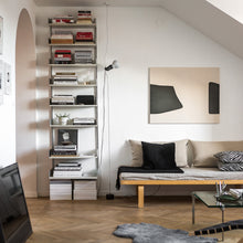 Load image into Gallery viewer, Parentesi Floor Lamp in living room.
