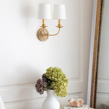 Load image into Gallery viewer, Southern Living Fisher Wall Light in bedroom.
