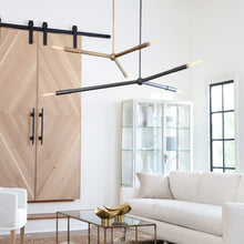Load image into Gallery viewer, Talon Chandelier in living room.

