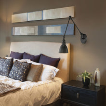 Load image into Gallery viewer, Dakota Adjustable Wall Light in bedroom.
