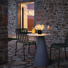 Load image into Gallery viewer, Clizia LED Battery Table Lamp in Outside Area.

