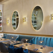 Load image into Gallery viewer, La Lollo Wall Light in restaurant.
