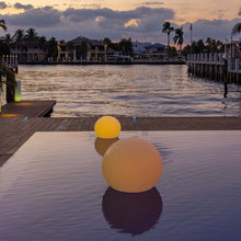 Load image into Gallery viewer, Flatball Floating Bluetooth Outdoor LED Lamp in Outside Area.
