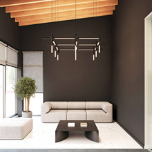 Load image into Gallery viewer, Labyrinth Square LED Pendant Light in livingr room.
