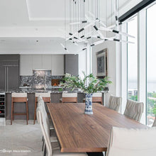 Load image into Gallery viewer, Ballet™ Spreader LED Multi Light Pendant Light in dining room.

