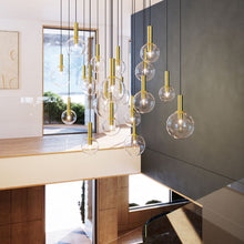 Load image into Gallery viewer, Bubbles Multi Light Pendant Light in living room.
