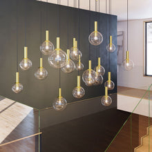 Load image into Gallery viewer, Bubbles Multi Light Pendant Light in living room.
