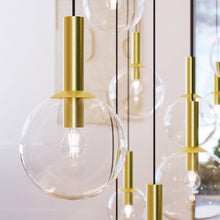 Load image into Gallery viewer, Bubbles Multi Light Pendant Light in living room.
