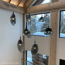 Load image into Gallery viewer, Cantina Tri-Spreader LED Pendant Light in living room.

