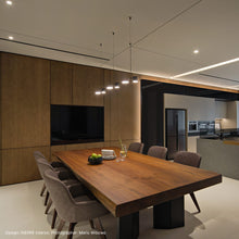Load image into Gallery viewer, Counterpoint™ Linear LED Pendant Light in dining room.
