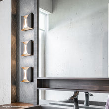 Load image into Gallery viewer, Folds Outdoor LED Wall Light in living room.
