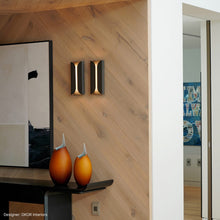Load image into Gallery viewer, Folds Outdoor LED Wall Light in living room.
