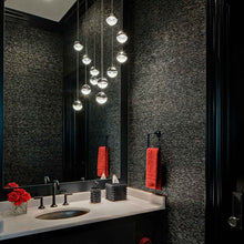 Load image into Gallery viewer, Grapes® 12-Light Round LED Multipoint Pendant Light in bathroom.
