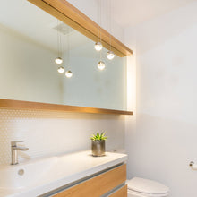 Load image into Gallery viewer, Grapes® LED Multipoint Pendant Light in bathroom.
