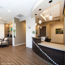 Load image into Gallery viewer, Liquid LED Pendant Light in dining room.
