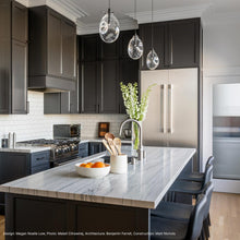 Load image into Gallery viewer, Liquid LED Pendant Light in dining room.
