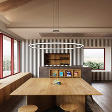 Load image into Gallery viewer, Luna™ LED Pendant Light in dining room.
