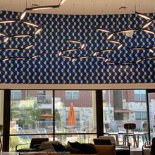Load image into Gallery viewer, Ola™ Tri-Star LED Pendant Light in restaurant.
