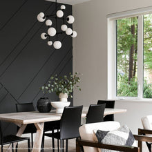 Load image into Gallery viewer, Sabon™ LED Pendant Light in living room.
