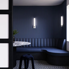 Load image into Gallery viewer, Scepter LED Wall Light in living room.
