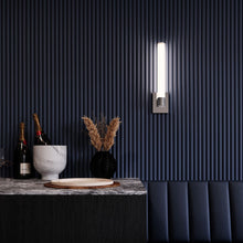 Load image into Gallery viewer, Scepter LED Wall Light in living room.

