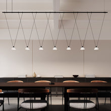 Load image into Gallery viewer, Suspenders® Tier Linear LED Pendant Light in dining room.
