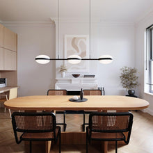 Load image into Gallery viewer, Pillows LED Pendant Light in living room.
