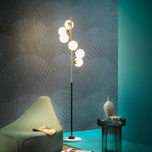 Load image into Gallery viewer, Galassia Floor Lamp in living room.
