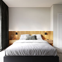 Load image into Gallery viewer, Suspenders® Standard Single LED Wall Light in bedroom.
