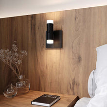 Load image into Gallery viewer, Suspenders® Standard Single LED Wall Light in bedroom.
