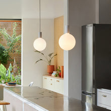 Load image into Gallery viewer, Alumina Sphere V LED Single Pendant Light in dining room.
