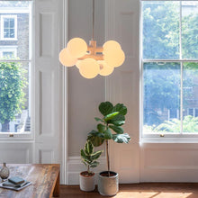 Load image into Gallery viewer, Echo Chandelier in living room.
